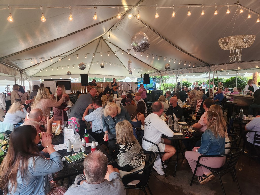 Attendees at TWIGS Patio Party for a Purpose 2025 at Heather's Cafe in Springboro