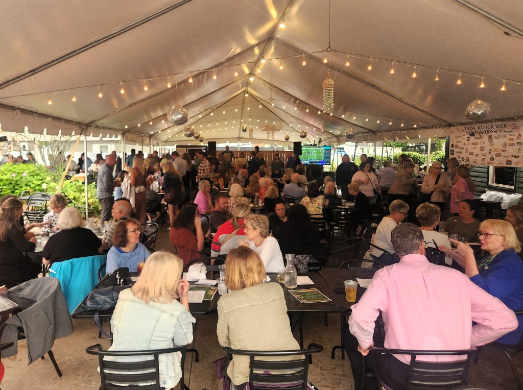 Attendees at TWIGS Patio Party for a Purpose 2025 at Heather's Cafe in Springboro