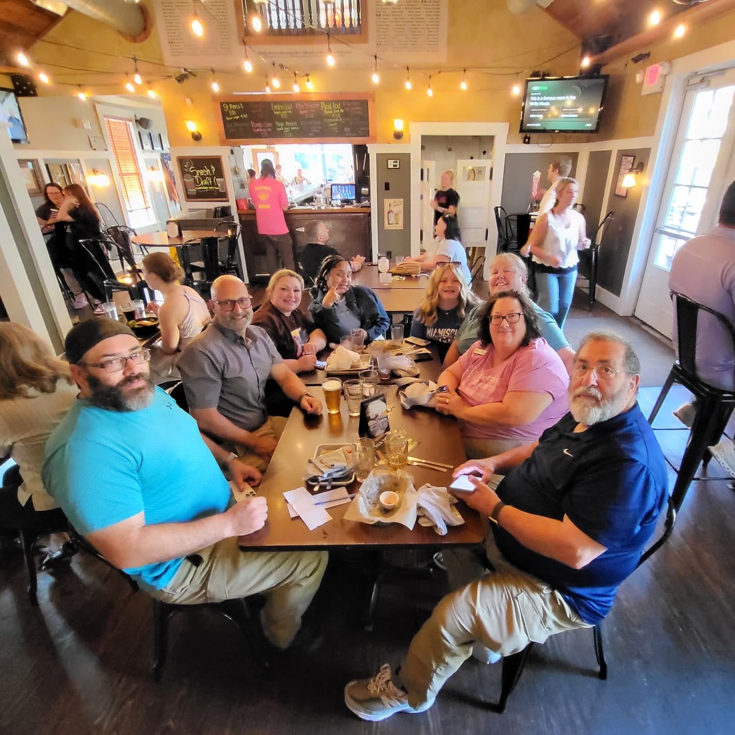TWIG members with family and friends at the 2025 5th Street Brew Pub Fundraiser.